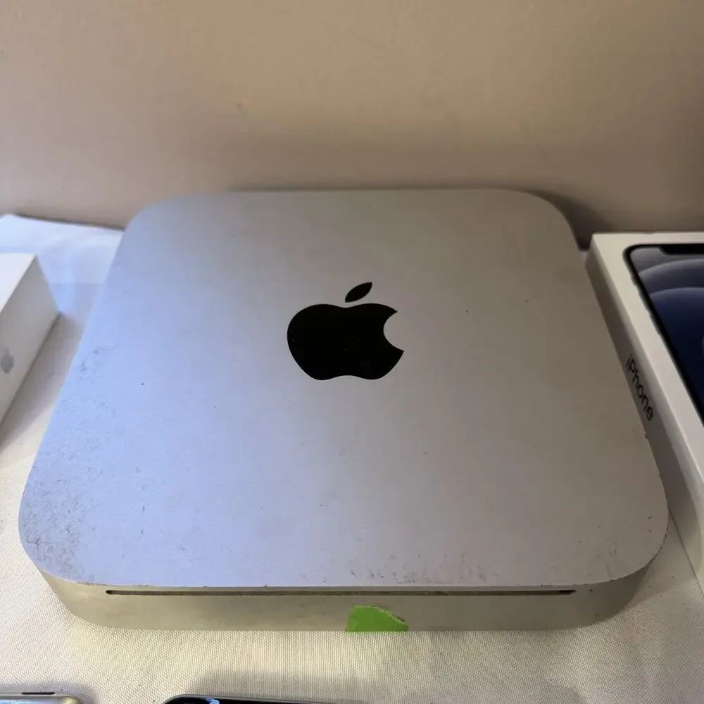 Apple products lot (28 items) Iphones, Mini Mac, tablet, boxes, accessories more
